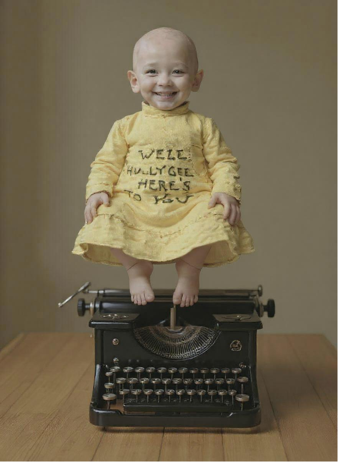 The Yellow Kid hovering over the typewriter
